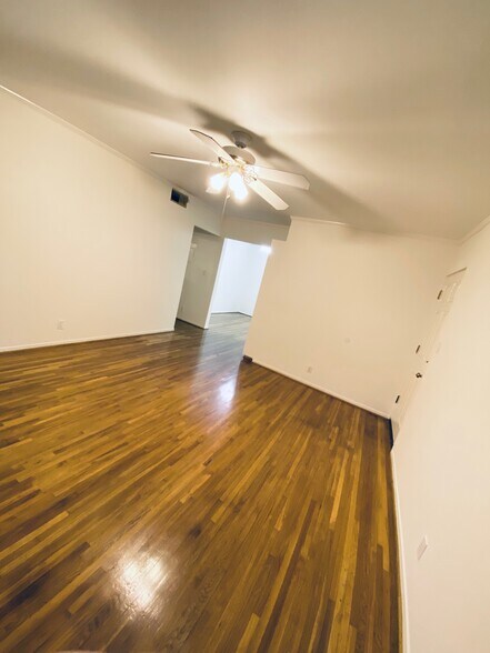 warm wood floors welcome you home - 5876 Bowcroft St