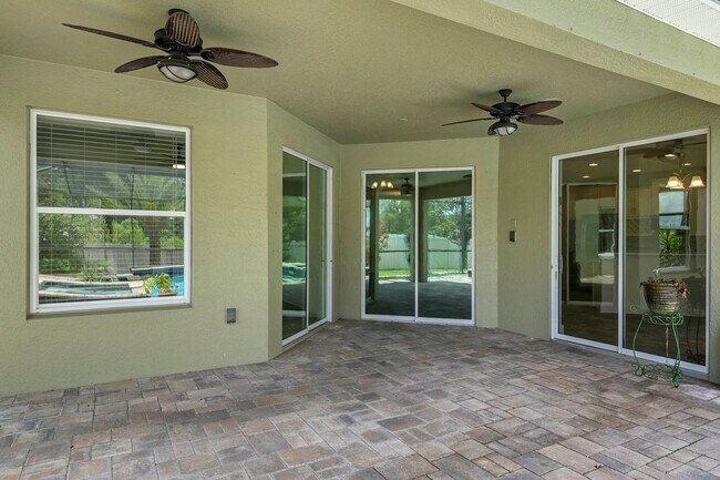 Building Photo - Expansive 4 bedroom, 3 bath remodeled home in gated community