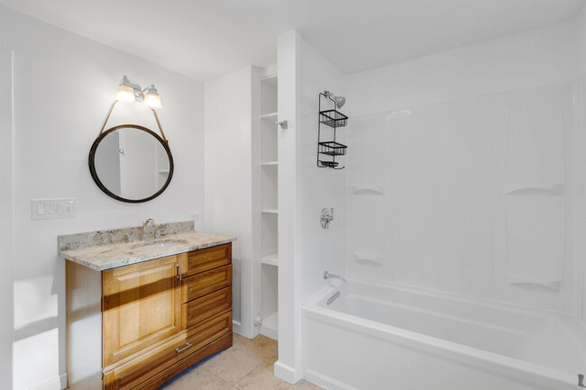 Bath with tub and shelving - 308 Portsmouth Ave