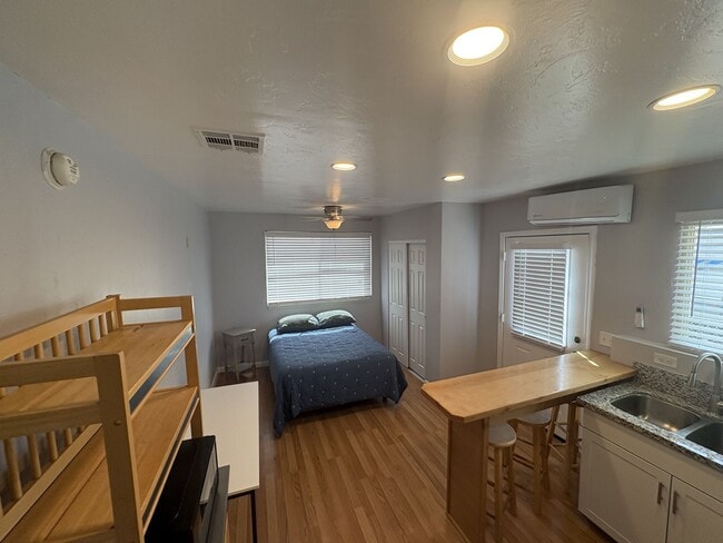 Building Photo - Beautiful furnished studio apartment