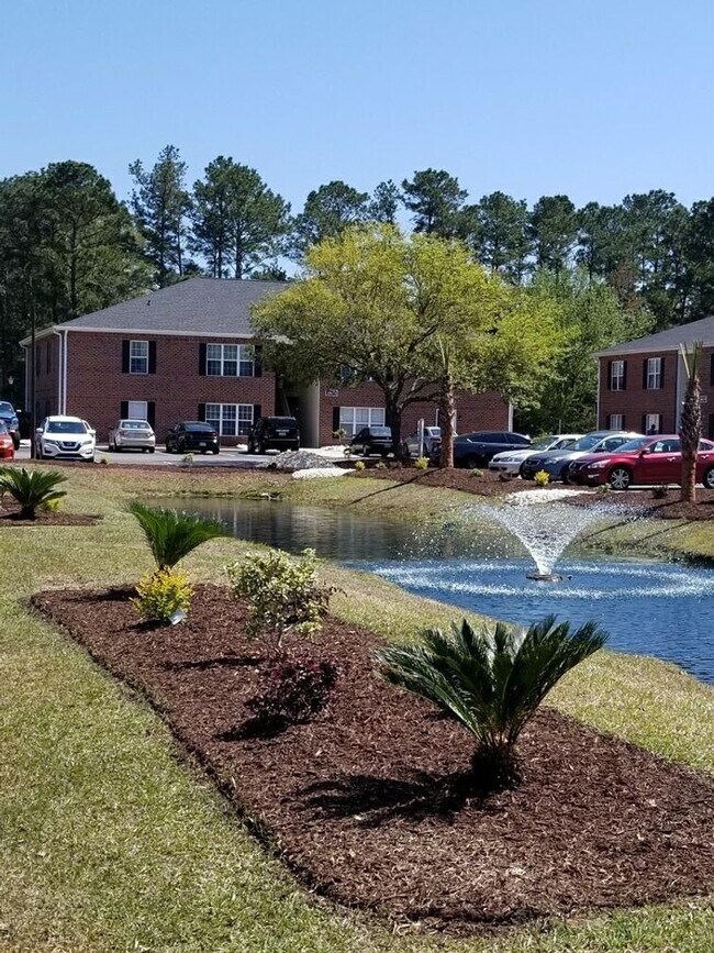 Building Photo - (843)742-5165 Available now—and easier to get into than a parking spot at the Beach! Rents always...