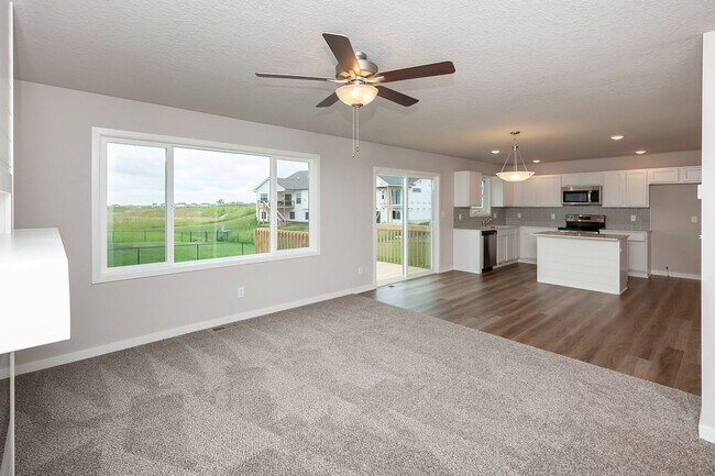 Building Photo - Prime Living: A Spacious Haven with Fenced Backyard in Ankeny