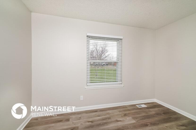 Building Photo - 1303 Woodcreek Dr