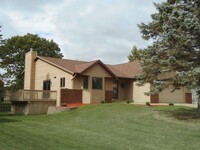 Building Photo - Spacious 4-Bedroom Home with Fireplace and...