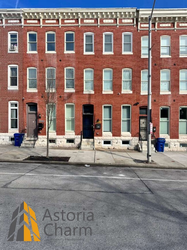 Building Photo - Beautifully Renovated 3BR Rowhome Near Johns Hopkins – Gated Parking + Modern Upgrades