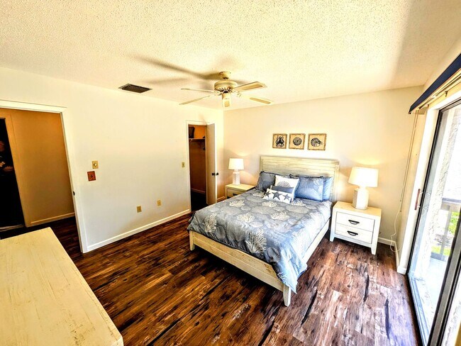 Building Photo - LEASE PENDING Annual/Seasonal turnkey furnished 2/2 end townhome in waterfront community by Siest...