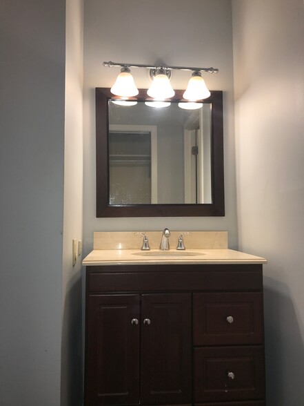 Separate vanity outside the master bath for privacy - 1200 23rd Street Northwest