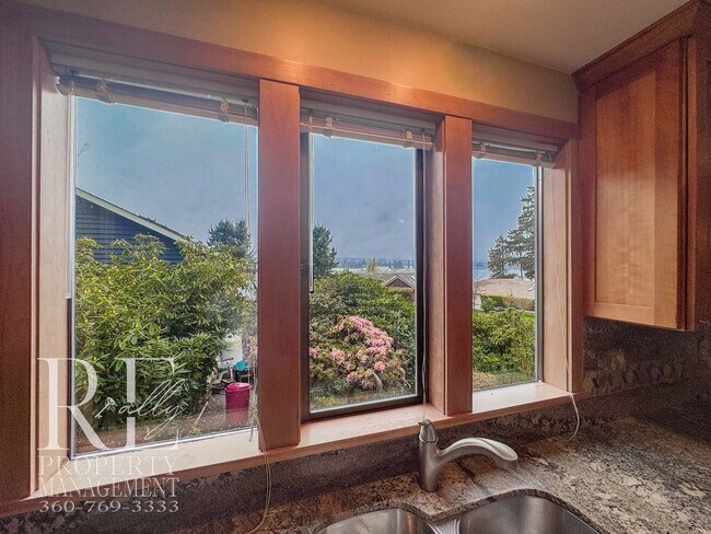 Building Photo - Vaulted 2-Bed Home with Scenic Views, Gas Fireplace & Oversized Deck