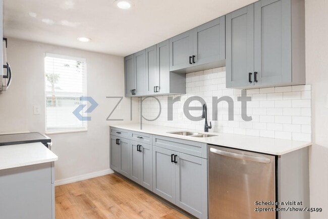 Building Photo - 909 E 28th Ave
