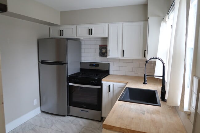 Building Photo - 1221 Powers Ave NW