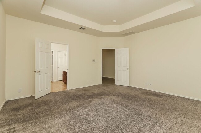 Building Photo - Spacious & Sun-Filled 4BR Retreat with Open-Concept Living and Versatile Dual Living Areas