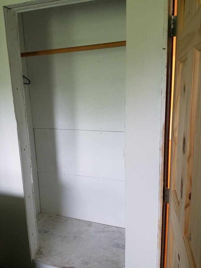 First floor Bedroom, south wall. Closet to the left of entry to Kitchen. - 15 Goodrich St