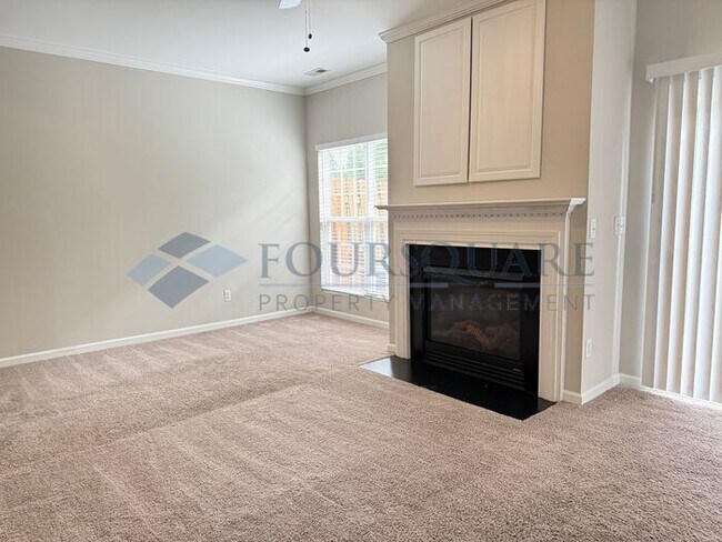 Building Photo - Lovely 3-Bedroom Townhome with Fireplace, Back Patio  & Community Amenities Included! Convenient ...