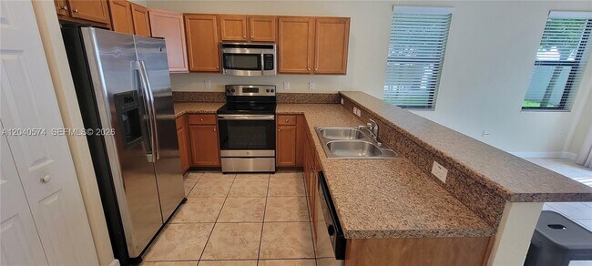 Building Photo - 8872 W 35th Ct