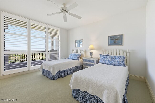 Building Photo - 8990 Bay Colony Dr