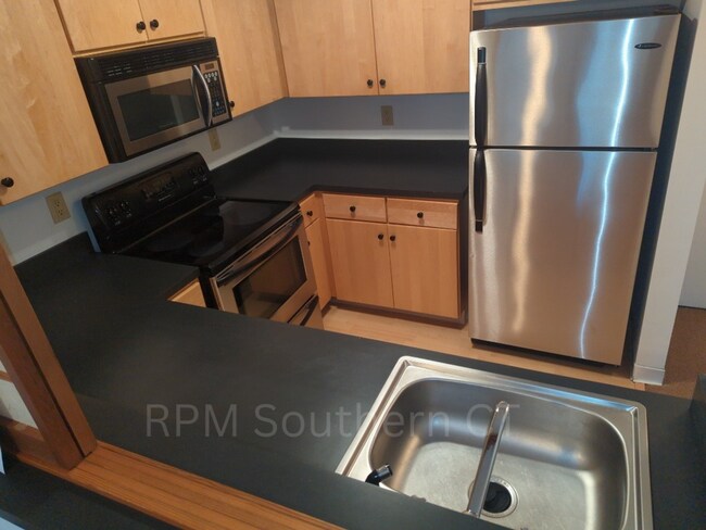 Building Photo - 1 Bedroom Condo | Whitneyville