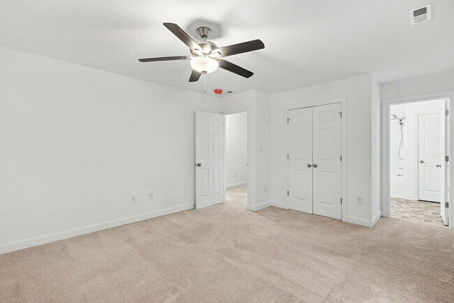 Building Photo - 4-bedroom, 2.5 bath with wooded view!