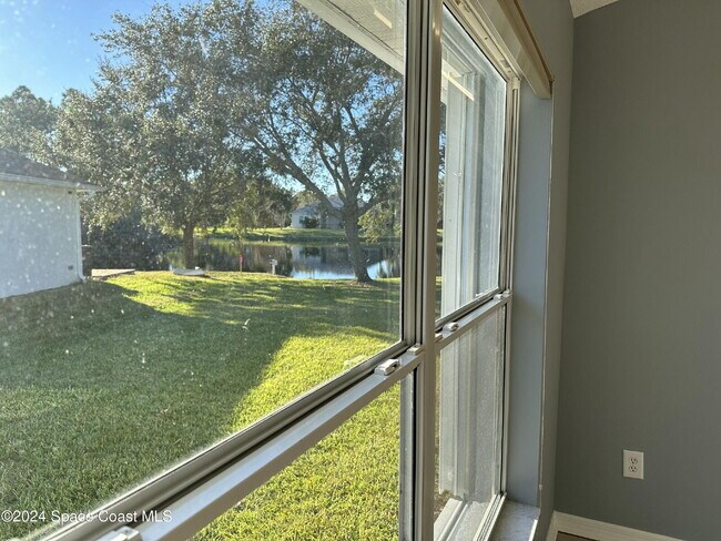 Building Photo - Charming Four Bedroom Home with a Beautiful Pond in the Back