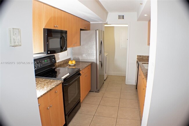 Building Photo - 6917 Collins Ave