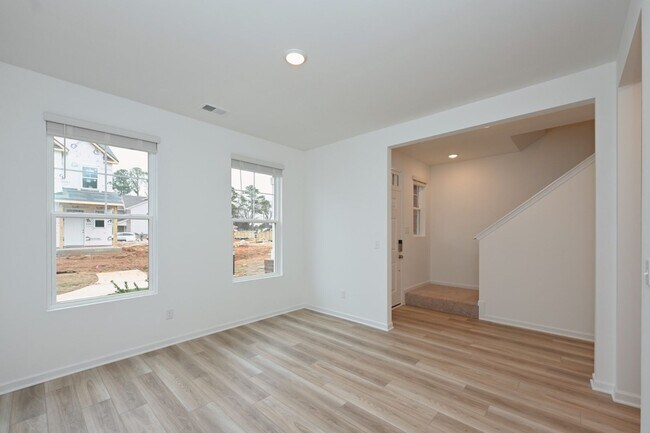 Building Photo - **BE THE LUCKY ONE TO LIVE IN THIS 2024-BUILT BRICK TOWNHOME IN THE VILLAS AT REGAL SQUARE FEATUR...