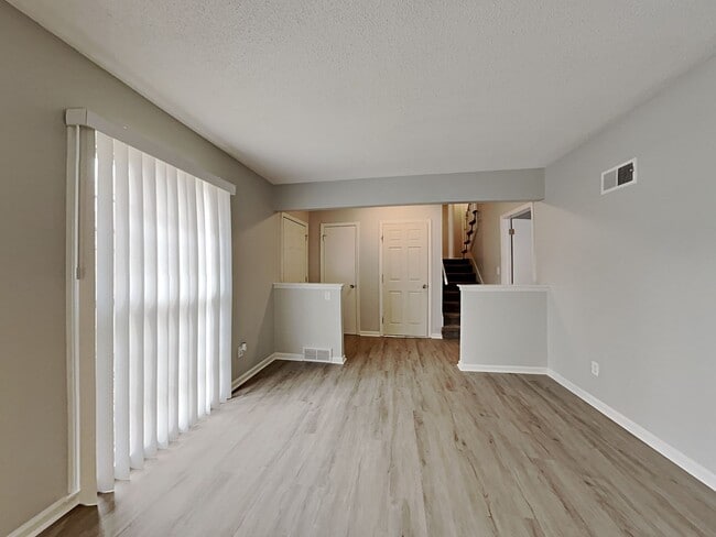 Building Photo - Spacious 4BR Home with Finished Basement, Fireplace & Unique Layout