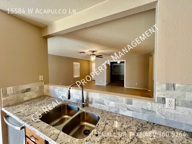 Building Photo - 15584 W Acapulco Ln