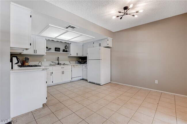 Building Photo - 6657 W Tropicana Ave