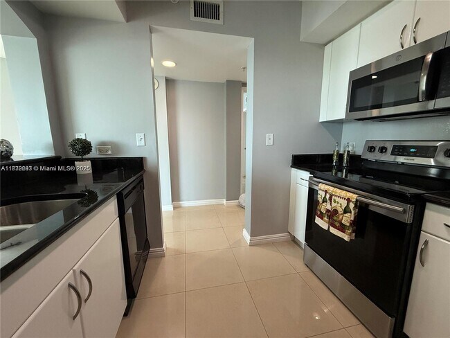 Building Photo - 9201 Collins Ave