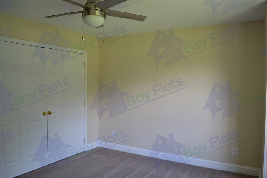 Bedroom at front of house with second closet. - 41195 Friendship Ct