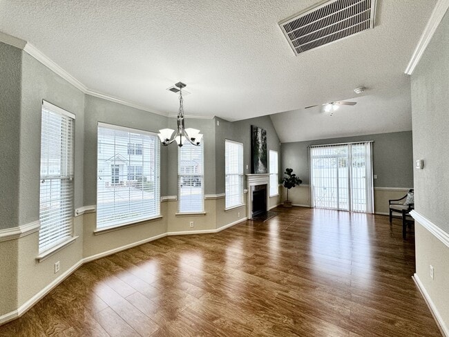 Building Photo - READY NOW!! End-Unit Loft-Style Condo w/1s...