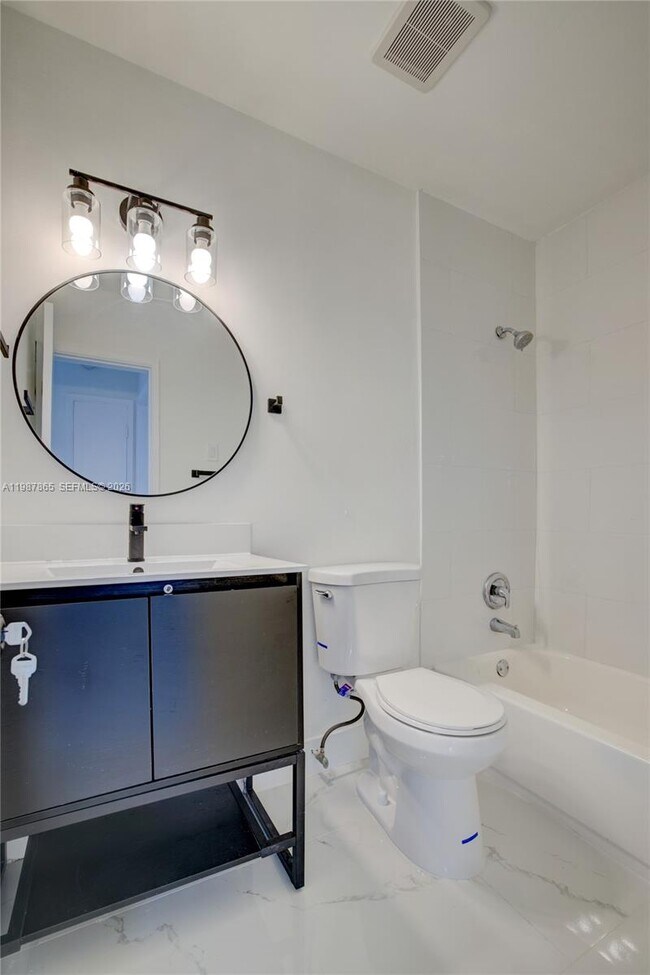 Building Photo - 1750 NE 56th Ct