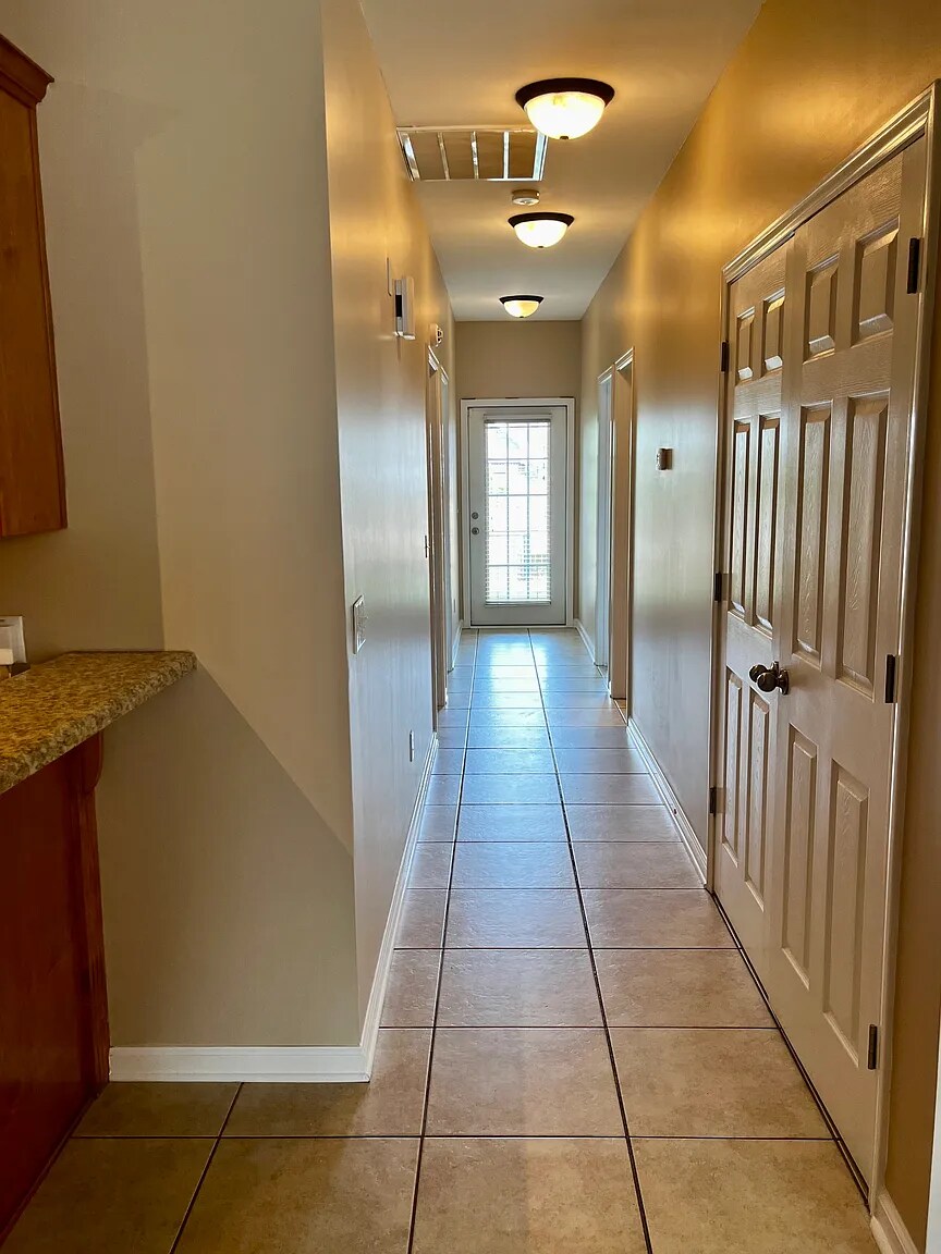 Bedrooms can be accessed down this hallway - 103 Whitney Ave