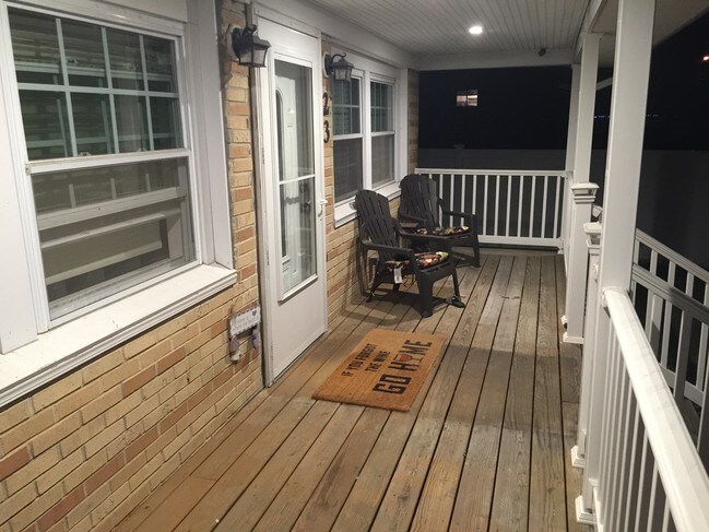 Front porch lighted - 23 E 6th St