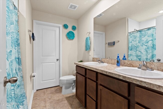 Building Photo - 5893 Creekside Crossing Dr