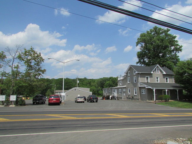 Building with Parking Area - MCS Properties Apartment