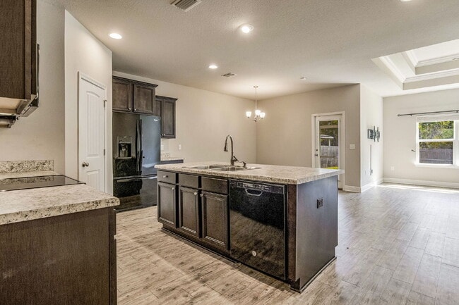 Building Photo - Welcome to this exquisite 4-bedroom, 2-bat...