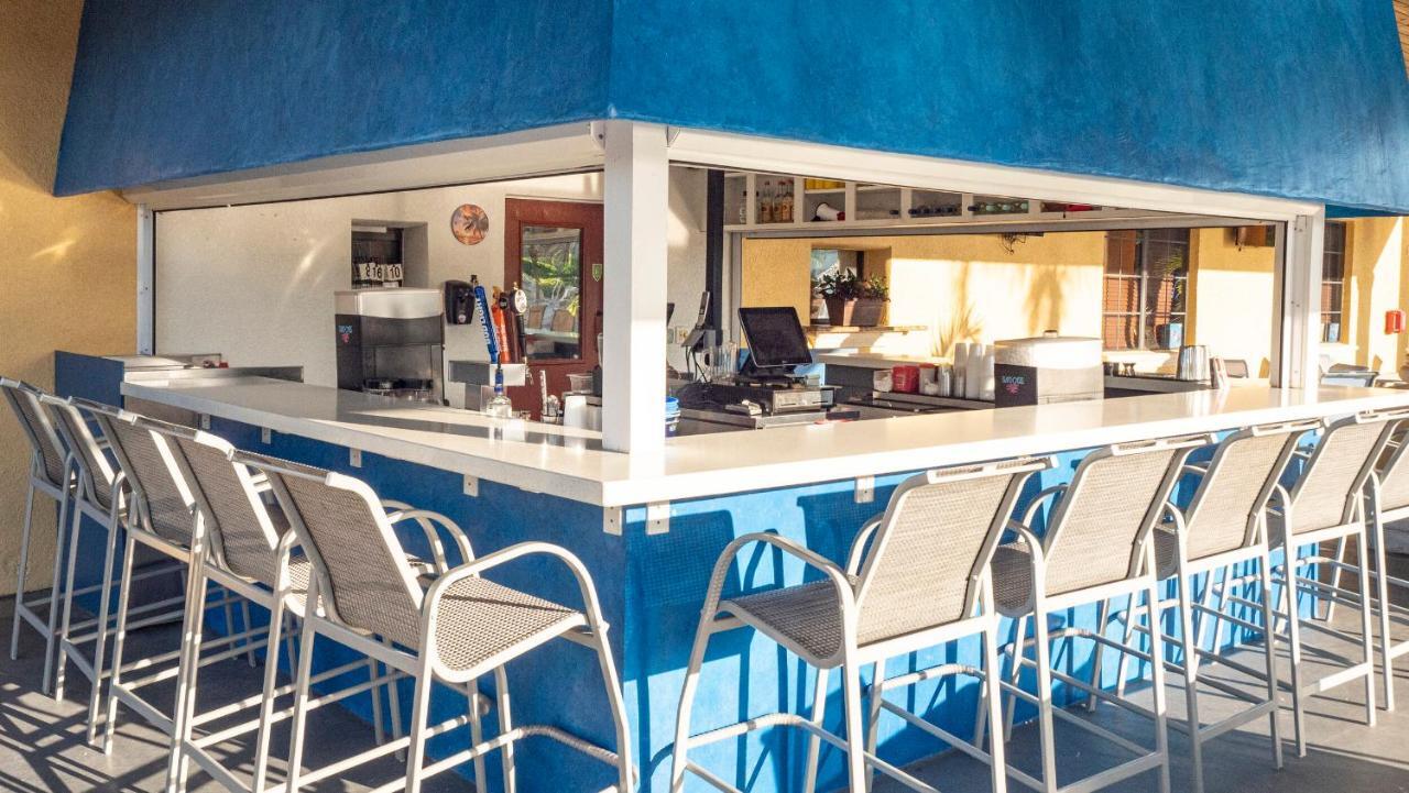 Bar and Grill - 8966 Sugar Palm Rd