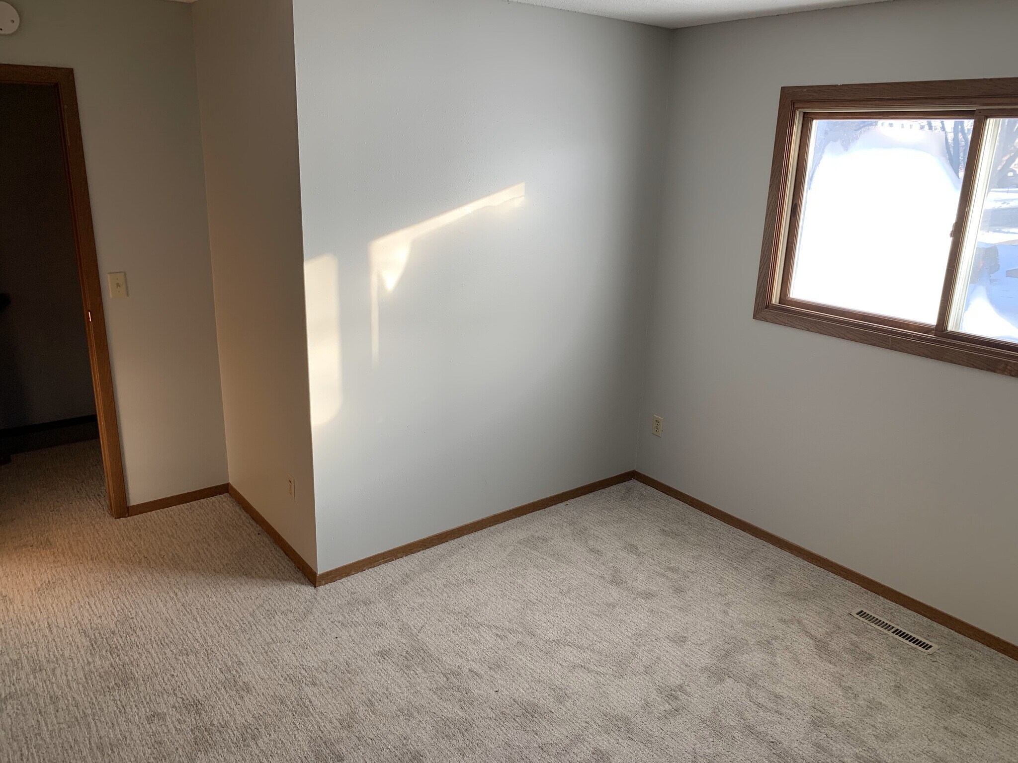 Spacious second-floor bedrooms with brand-new carpet and large windows offering natural light and st - 4903 W Kirkwood Cir