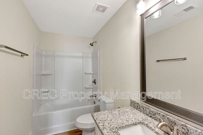 Building Photo - 6961 Raymond Ave