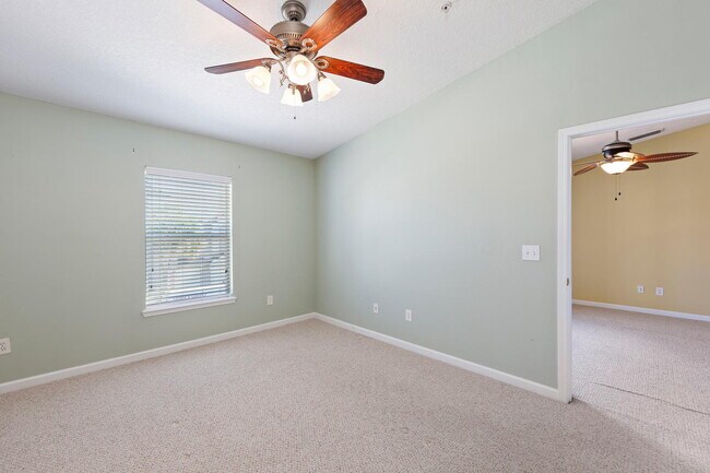 Building Photo - Beautifully Updated & Spacious 3BR/2BA Condo in a Secure Gated Community — Includes Cable, Intern...