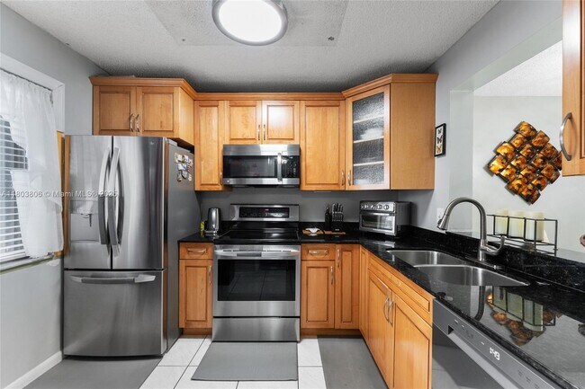 Building Photo - 8550 N Sherman Cir