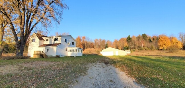 Building Photo - Renovated Farmhouse, 30+ Acres with Pole Barn!