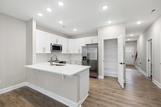 Building Photo - Luxury New 3BR Townhomes | Garage + Pool | 7 min to Fort Bragg