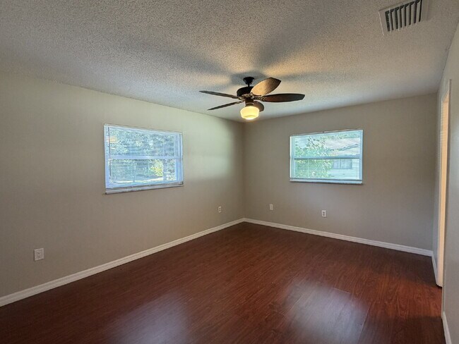 Building Photo - "Charming 3-Bedroom Home with Gleaming Hardwood Floors!"