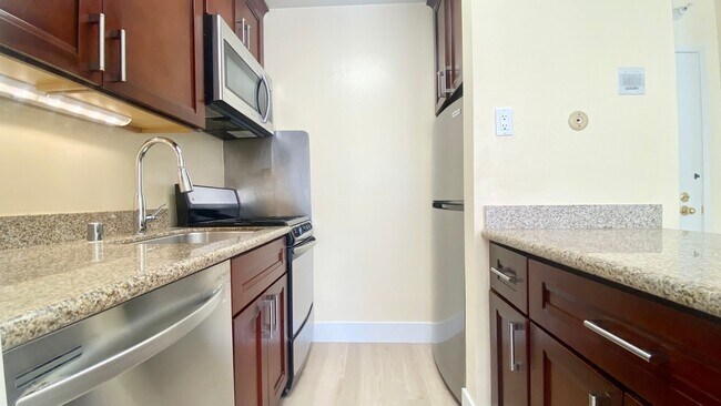 Building Photo - Large & Sunny Deck with this Cozy 1-Bedroom