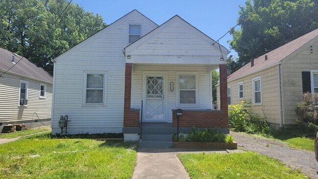 Primary Photo - Two Bedroom Home with Fenced In Backyard