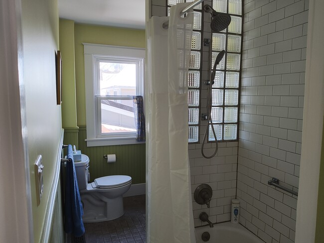 Bathroom, with tub and rain shower - 413 N Geneva St