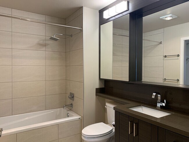 Building Photo - Urban Living at the Vik - Top Floor Condo