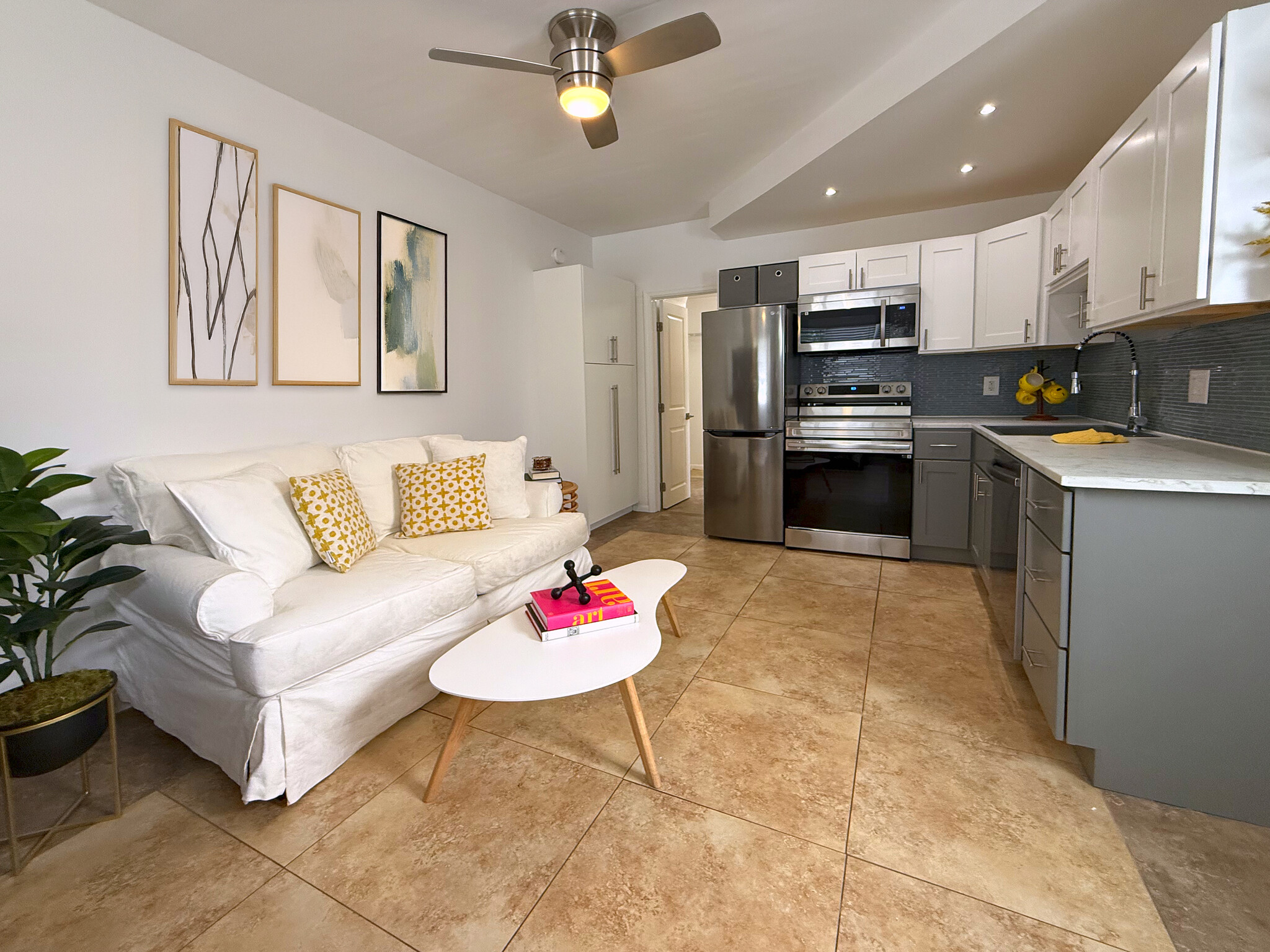 Living Room and Kitchen. Area is big enough for a breakfast nook - 630 NE 37th St