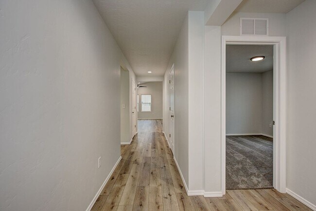 Building Photo - The 3 bedroom, 2 bedroom home also has a f...